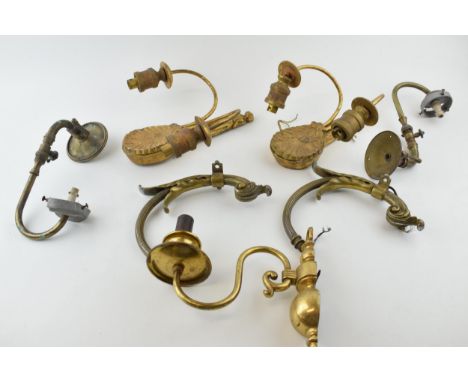 A collection of vintage and antique brass and wooden lighting and lamp fixtures and fittings, to include wall sconces and sim