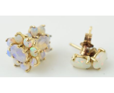 Two pairs of 9ct gold opal earrings, one pair of floral form, 2.2g (two pairs).