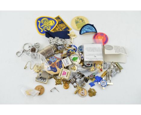 A large collection of items relating to the Girl Guides to include enamel badges, patches and similar items. (Qty)
