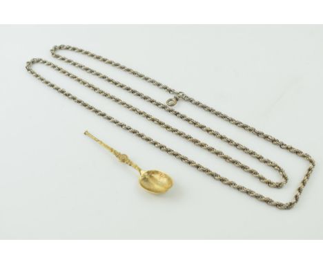 White metal (tests as silver) fancy link longuard chain, 62.6g, with metal clasp, 130cm long, with a gilt silver spoon, 10.5g