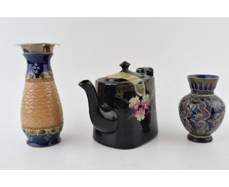 Royal Doulton stoneware to include a silver topped vase, a Doulton Lambeth floral bulbous vase, 11cm tall, and an early Victo