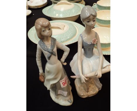 Two ceramic female Spanish figurines