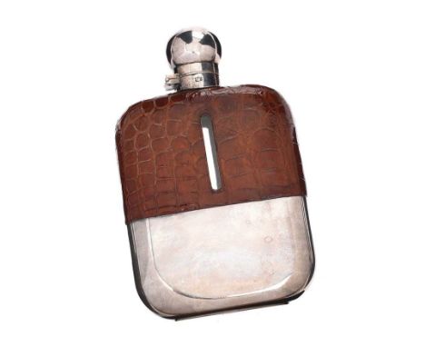 SILVER PLATED HIP FLASK WITH CROCODILE SKIN CASE.HEIGHT: 6½ INCHES.WIDTH: 4½ INCHES.DEPTH: 1½ INCHES.IN GOOD CONDITION.
