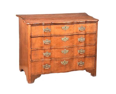 ANTIQUE OAK FOUR DRAWER CHEST WITH ORNATE BRASS HANDLES.RAISED ON BRACKET FEET.HEIGHT: 29 INCHES.WIDTH: 36 INCHES.DEPTH: 20 I