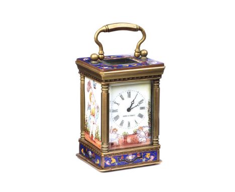MINIATURE ENAMEL & BRASS CARRIAGE CLOCK WITH THREE PORCELAIN PANELS & A DIAL OF 1½ INCHES X 2½ INCHES.MADE IN FRANCE.HEIGHT: 