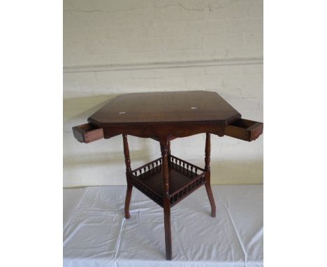 An Edwardian Mahogany Square Topped Games Table with Galleried Stretcher Shelf and Four Small Drawers at Corners. 