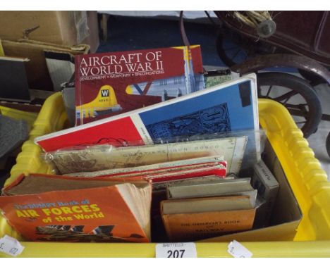 A Box Containing Playing Cards Maps Books Etc,