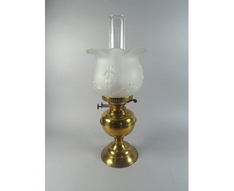 A Brass Oil Lamp with Duplex Controls and Moulded Shade. 
