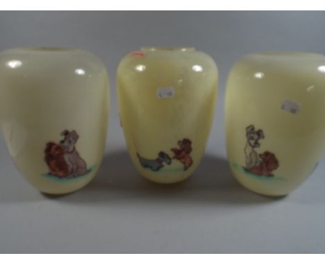 A Set of Three Opaque Glass Lamp Shades Decorated with Lady and The Tramp.