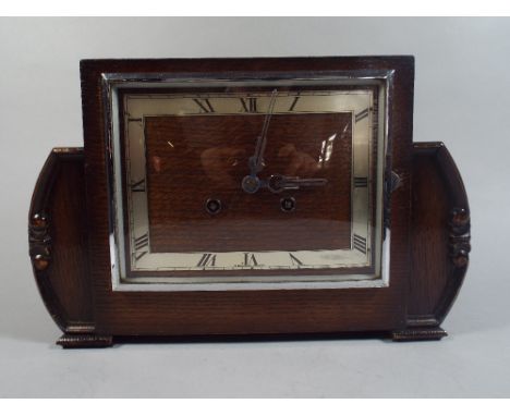 An Oak Art Deco Eight Day Mantle Clock. 