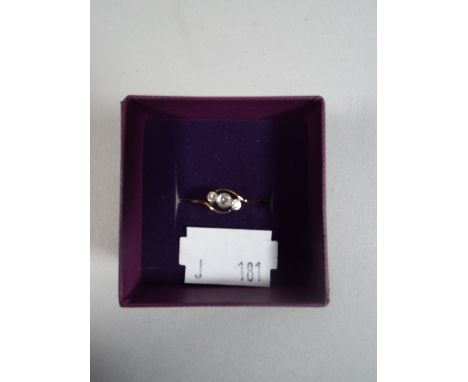 An 18 Carat Gold Three Stone Ring. 