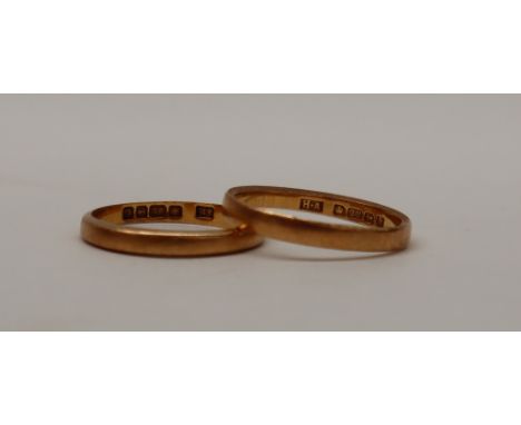 Two 22ct gold wedding bands, both size K, approximately 4 grams
