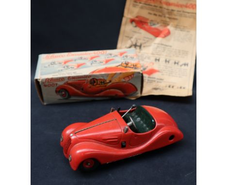 A Schuco Examico 4001 clockwork model with box and leaflet