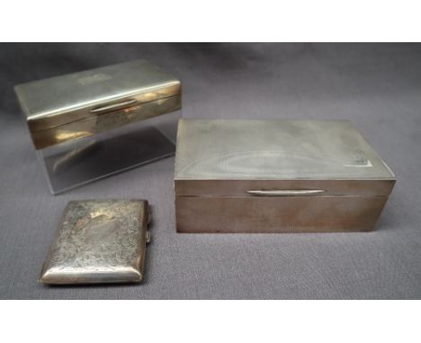 A George V silver cigarette box of rectangular form, London, 1936, Alfred Ernest Neighbour, 16.5cm long together with another