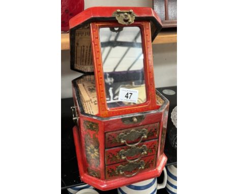 A Chinese lacquered jewellery/vanity wooden box with 3 drawers and a mirror