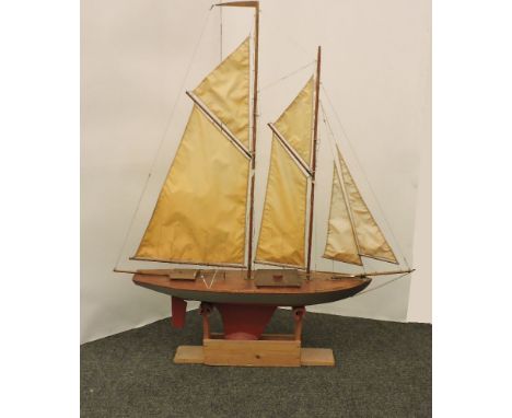 A model remote control pond yacht, 'Pilgrim of Salem', with control unit