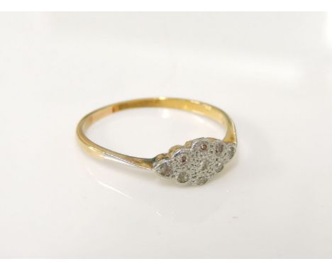 An Art Deco diamond lozenge cluster ring, marked 18ct and plat