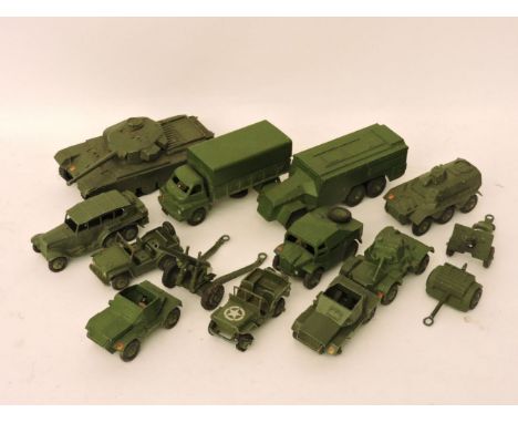 A collection of Dinky military vehicles, to include a a three ton army wagon (621), armoured commando vehicles (677), field a