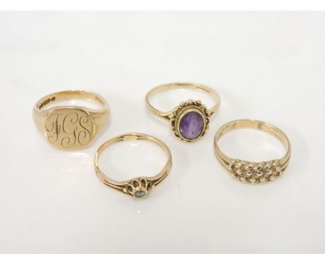 A 9ct gold single stone amethyst ring, a 9ct gold signet ring with engraved initials, a 9ct gold single stone diamond ring, a