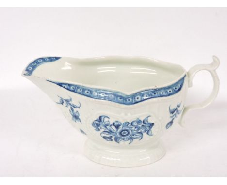 A Worcester blue and white sauce boat, moulded panels with workman's mark, chipped, cracked, 19.5cm long