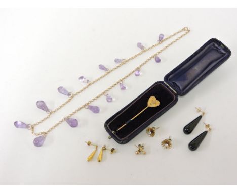 A gold belcher chain necklace, with graduated amethyst pipens beads, marked 9k, a pair of gold black onyx drop earrings, mark