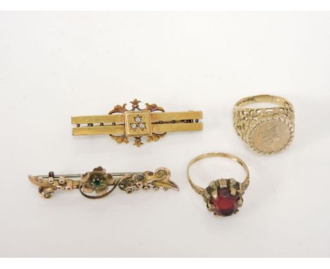 A 9ct gold Spanish Tallar coin 1853 token ring, a gold oval cut red glass ring, a gold bar brooch set with three diamonds, an