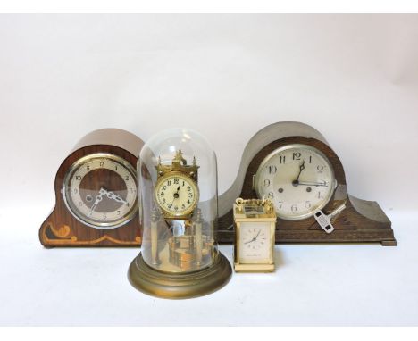 A London Clock Co brass carriage clock, an Anniversary clock, and two early 20th century mantel clocks