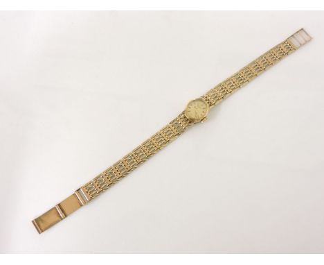 A 9ct gold ladies Rotary mechanical bracelet watch, with baton dial, 19.97g