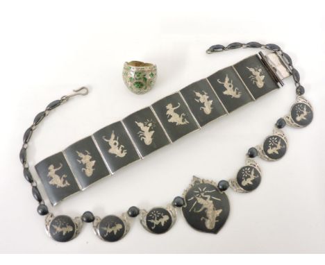 A Siam silver and black enamel necklace, six smaller plaques etched with dancers and a large centrepiece, a similar Siam silv