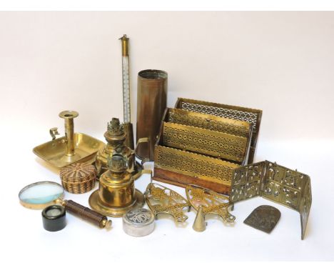 A pair of Victorian oak and brass letter racks, together with a brass magnifying glass, a chamber stick, a shell case, two oi