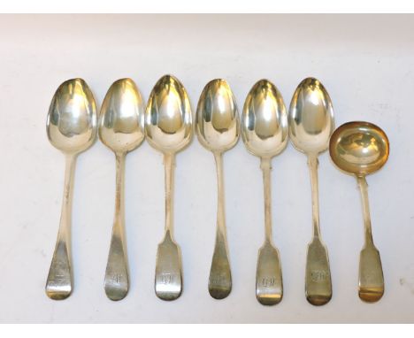 Six various Georgian and later table spoons, together with a silver sauce ladle