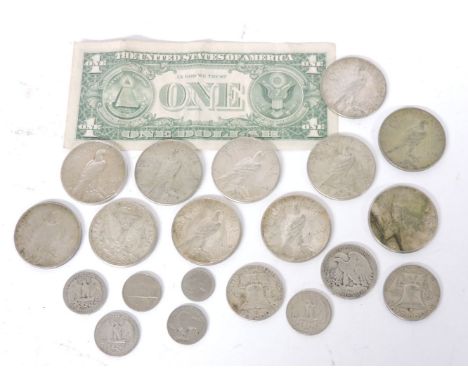 Eleven American silver dollars, comprising one Morgan dollar, 1921, (San Francisco), ten Peace dollars (various dates and min