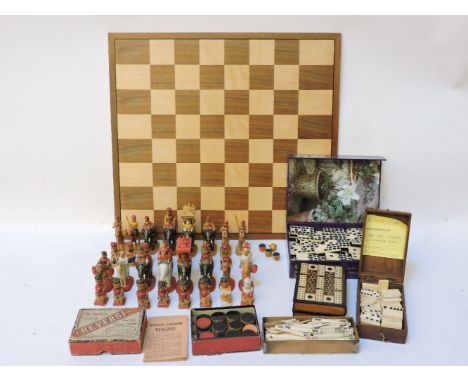 A hand carved and painted wood Indian chess set, c.mid 20th century, one hundred and twenty bone Mahjong counters, ebony and 