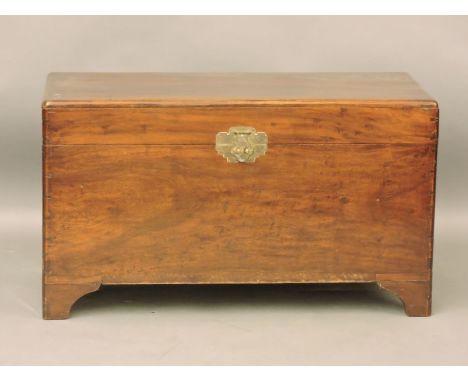 A Chinese hardwood blanket box, on short bracket feet, 104cm wide