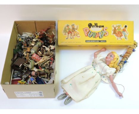 A collection of die cast and hollow cast farm animals, Britains, etc. together with a Pelham puppet SL fairy