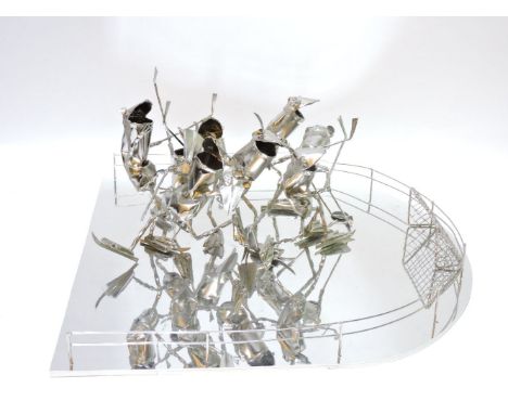 'The Ice Hockey Scrum', hand beaten sculpted copper and plated group of a humorous comical character group playing ice hockey