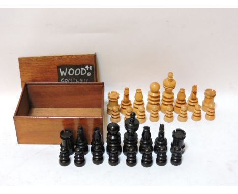 An Old English style turned boxwood and ebony chess set, in mahogany box, king 9cm, pawn 3.5cm