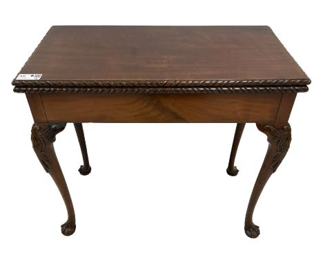 Late 19th century mahogany card table, rectangular fold-over top with gadroon moulded edge and baize lined interior, over dou