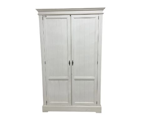 Laura Ashley - white painted double wardrobe, two panelled doors enclosing single shelf and hanging railDimensions: Height:&n