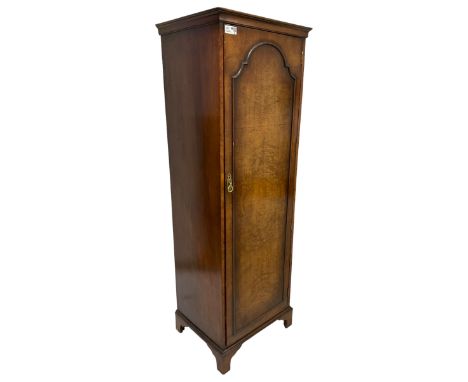 Early 20th century walnut hall wardrobe, cavetto cornice over single door with arch moulded faux panel, enclosing shelf and h