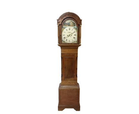 8-day - mid 19th century mahogany longcase, with a round top and carved frieze beneath, glazed break arch door flanked by two