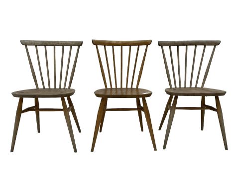 Ercol - 1960s set of three elm stick back chairs