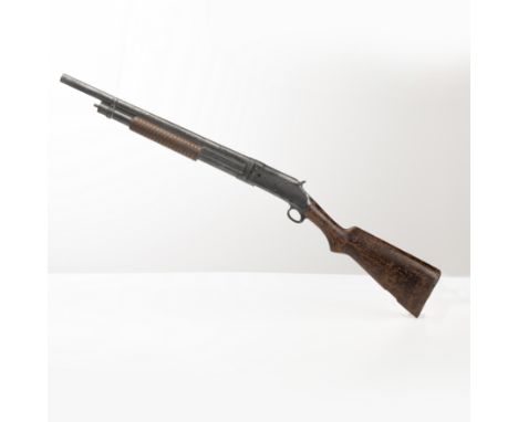 An Winchester Model 1897 shotgun prop as seen used by Brendan Fraser as “Rick O’Connell” in The Mummy. The Mummy is a rousing