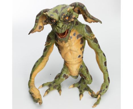 Original full-sized hand puppet prop used in the production of the 1990 horror fantasy film Gremlins 2: The New Batch. The ma
