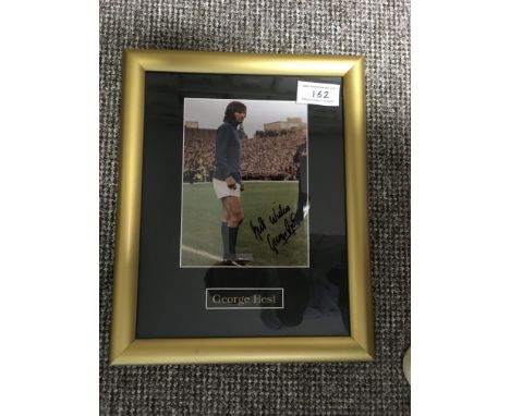 George Best Signed + Framed Manchester United Print: Featuring Best in Blue Man Utd kit and hand signed without dedication.