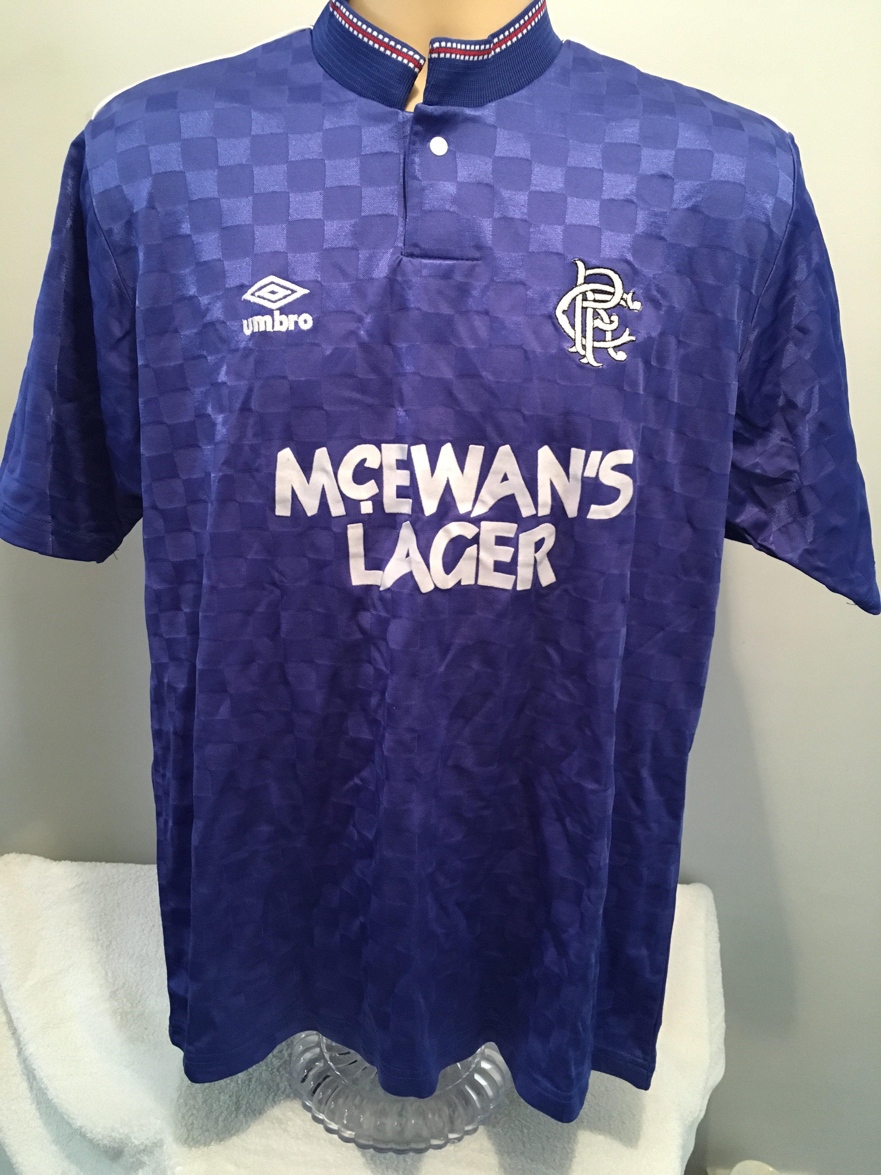 1980s Glasgow Rangers Match Worn Football Shirt: Blue Umbro short sleeve shirt with McEwans Lager