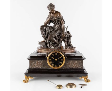 &nbsp;A mantle clock, marble mounted with bronze and a patinated bronze figurine.Figurine signed 'Mercier', depicting a woman