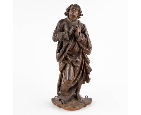 An antique wood sculpture of a holy figurine, probably part of a Golgotha. 17th century.&nbsp;Dimensions:(D:12 x W:20 x H:48 