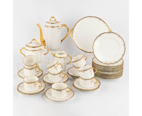 Limoges, a porcelain coffee service, finished with a gilt rim.&nbsp;- 9 cups- 10 saucers- 10 plates- Coffee pot- Sugar pot- M