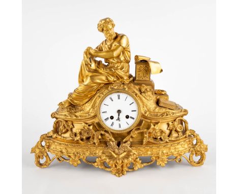 A mantle clock 'Lois De Solon', gilt bronze.An image of the Greek statesman&nbsp;'Solon' when writing his 'Laws of Solon'.&nb